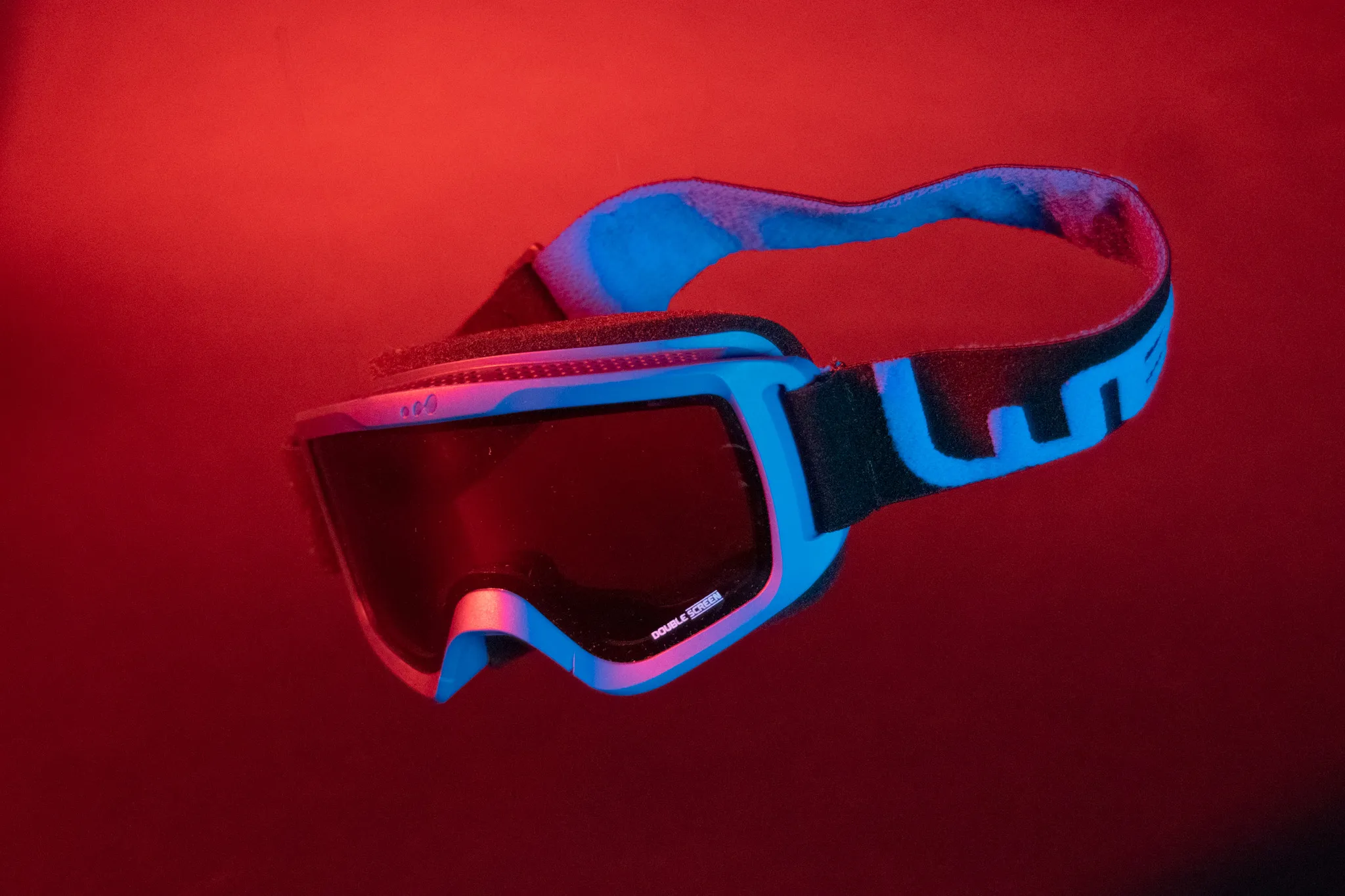 Close product shot of the goggles in red light