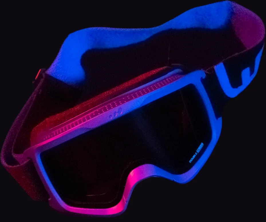 Neon-lit render of the goggles in blue and magenta on black