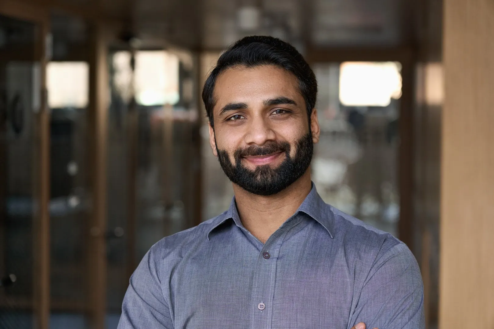 A young professional in a button-down shirt
